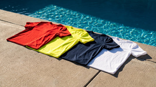 Lifeguard shirts in red, yellow, navy and white compared for visibility against pool water