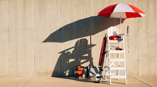 Fully equipped lifeguard stand with rescue tube, backboard, hip pack and whistle