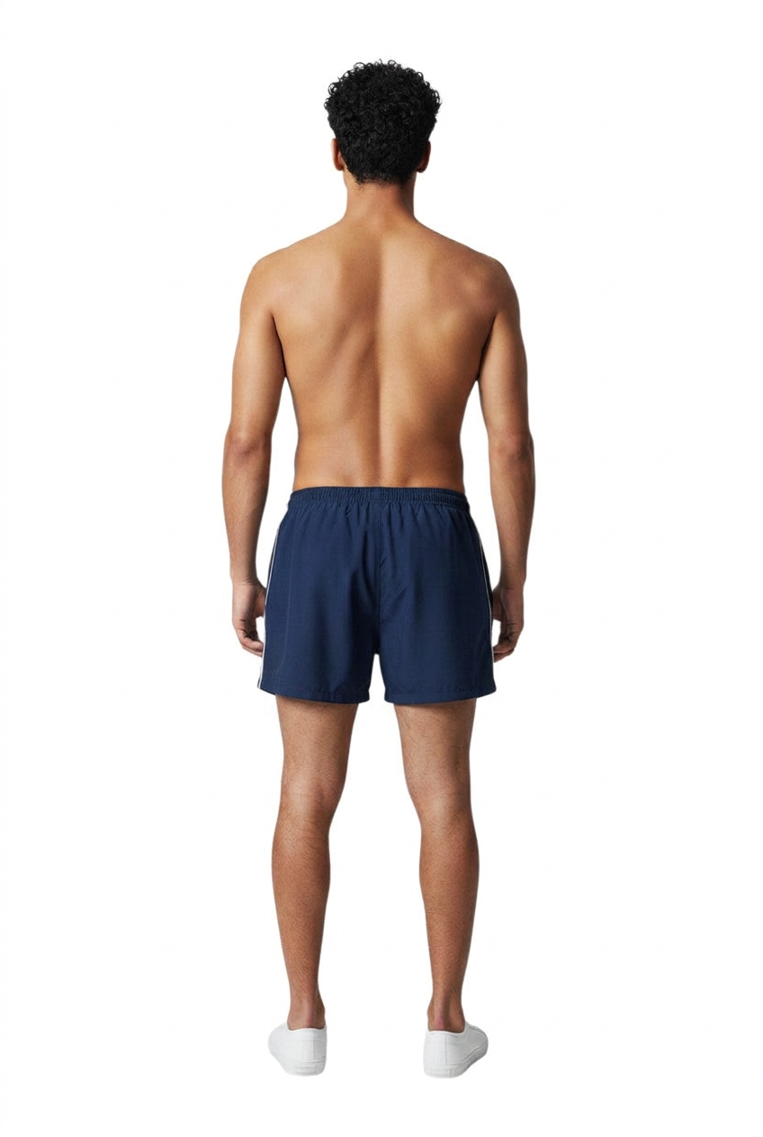 The Lifeguard Store navy blue nylon trunks with white side piping and elastic waistband.