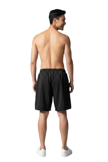 The Lifeguard Store black polyester board shorts with liner, elastic waistband, and cargo pocket. UPF30+.