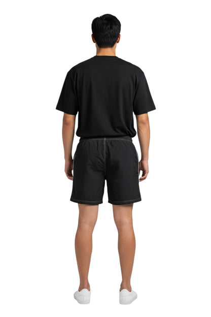 The Lifeguard Store black polyester spandex boardshorts with drawstring, contrast stitching, and side pocket.