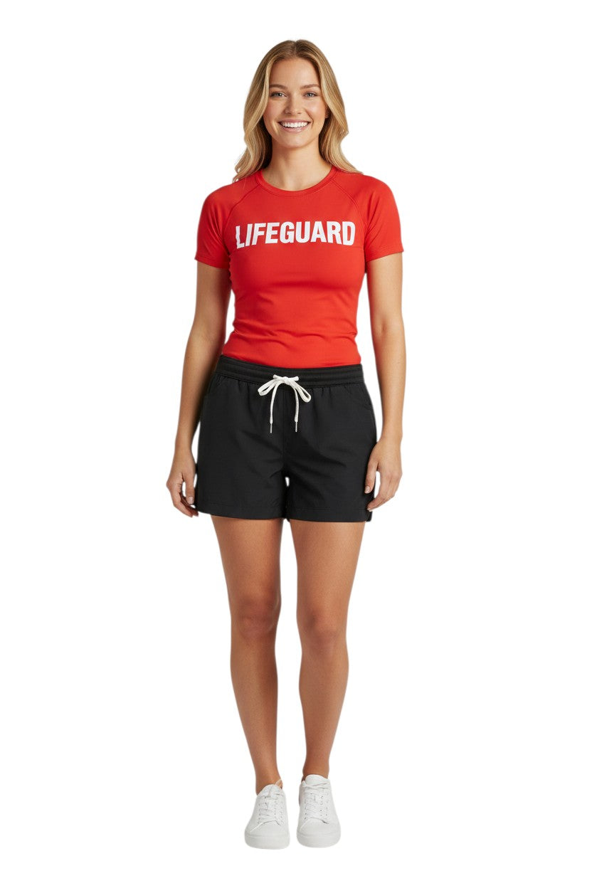 The Lifeguard Store black polyester comfy shorts with elastic waistband, drawstring, and two front pockets. UPF30+ UV protection.
