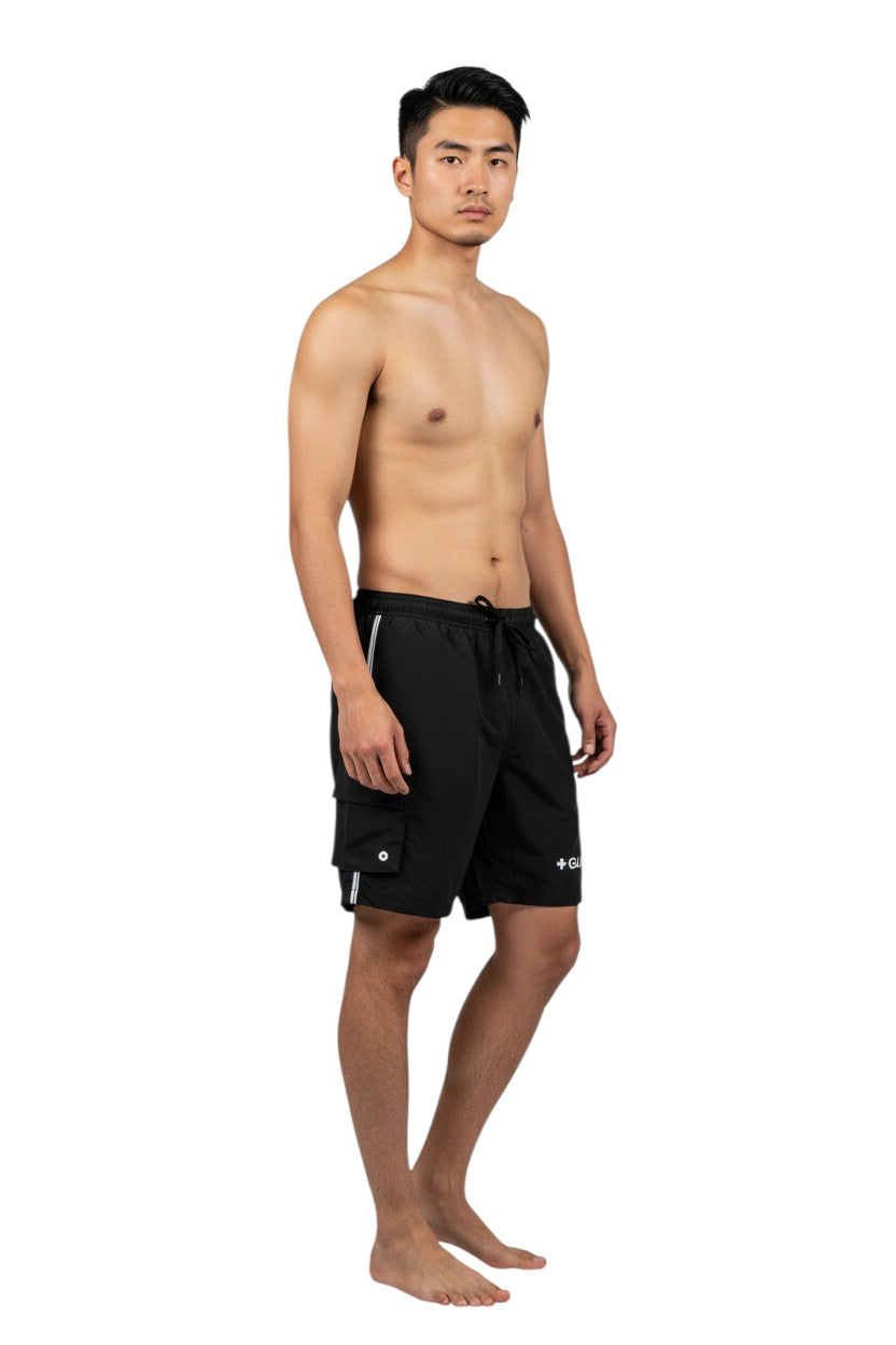 The Lifeguard Store black polyester board shorts with liner, elastic waistband, drawstring, cargo pocket, and GUARD logo.