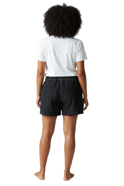 The Lifeguard Store black polyester-spandex board shorts with drawstring waist, side pocket, and GUARD logo.