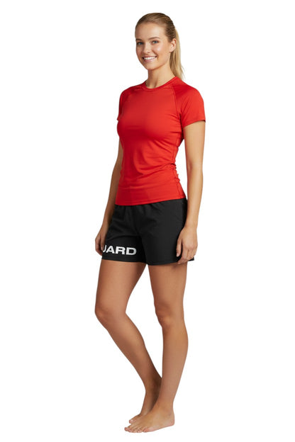 The Lifeguard Store black 4-way stretch unisex lifeguard deck shorts with "GUARD" printed on the leg. 100% polyester.