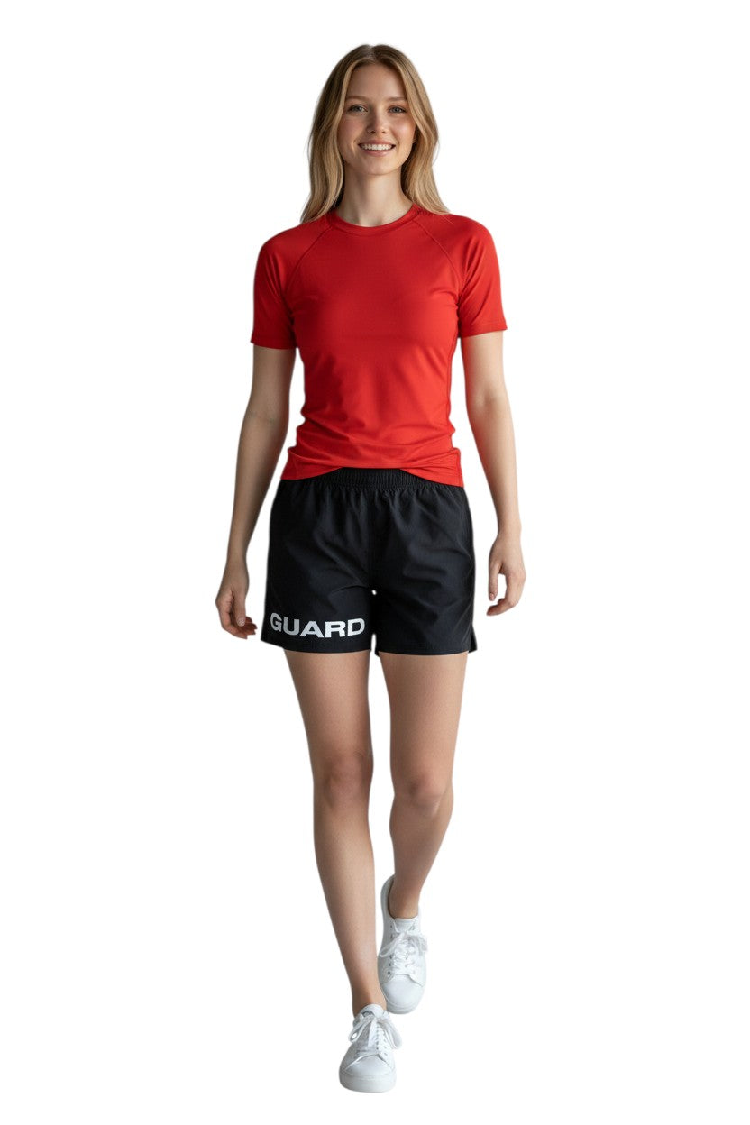 The Lifeguard Store black 4-way stretch unisex lifeguard deck shorts with "GUARD" printed on the left leg.
