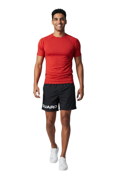 The Lifeguard Store black 4-way stretch unisex lifeguard deck shorts with "GUARD" printed on the leg. 100% polyester.