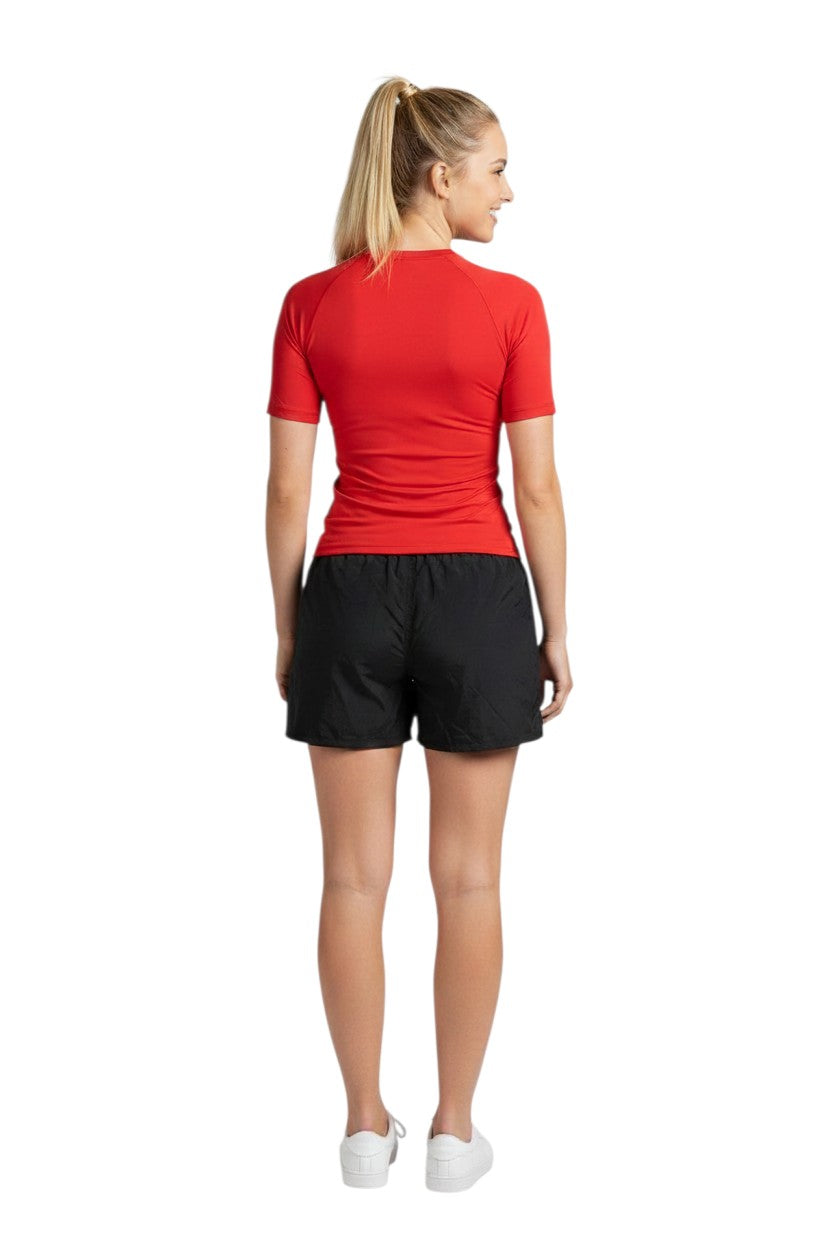 The Lifeguard Store black 4-way stretch unisex lifeguard deck shorts with white "GUARD" text.