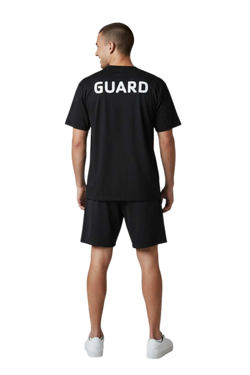 The Lifeguard Store black polyester Dri-Fit tee with white GUARD logo on back. Short sleeve, crew neck.
