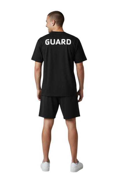 The Lifeguard Store black polyester Dri-Fit tee with white GUARD logo on back. Short sleeve, crew neck.