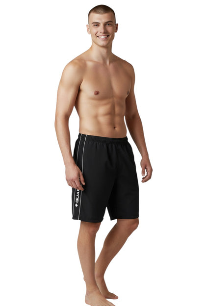 The Lifeguard Store black polyester spandex boardshorts with white piping and "GUARD+" logo on the side.