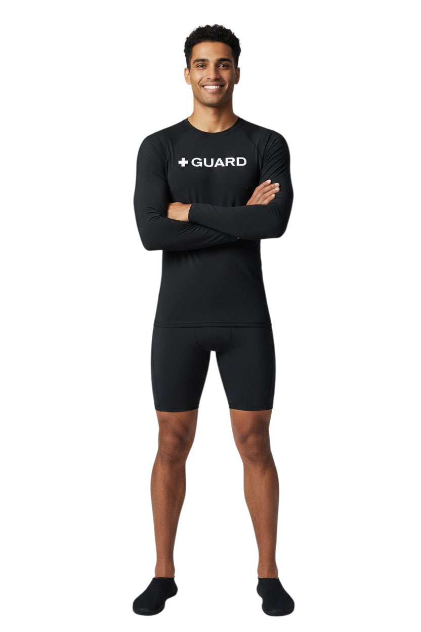The Lifeguard Store black long sleeve crewneck rashguard with "+ GUARD" graphic on chest. Made of poly-spandex blend.