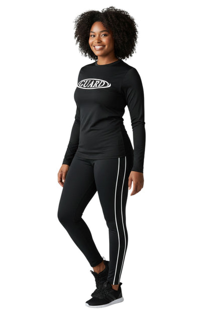 The Lifeguard Store black long sleeve crew neck rashguard with white GUARD logo on chest. Made of poly-spandex blend.