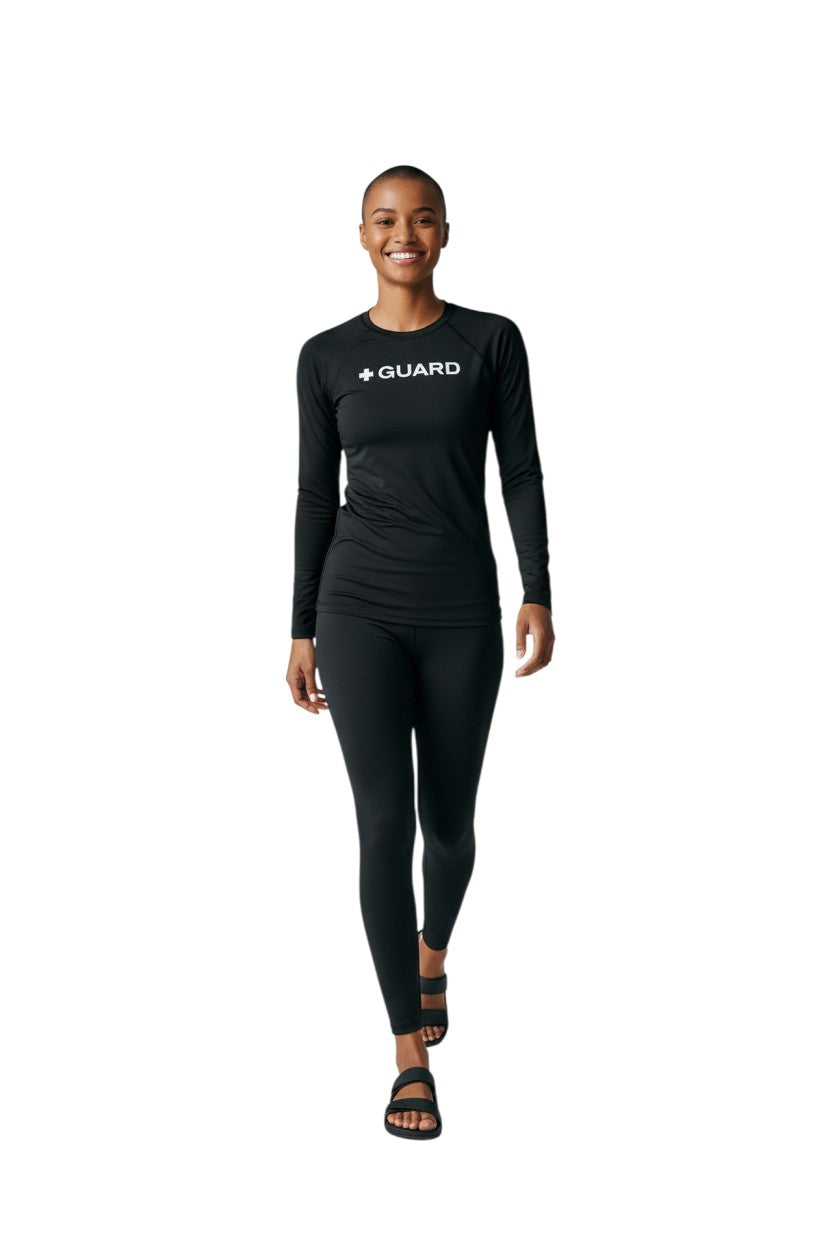 The Lifeguard Store black long sleeve crewneck rashguard with "+ GUARD" printed on the chest. Made of poly-spandex blend.