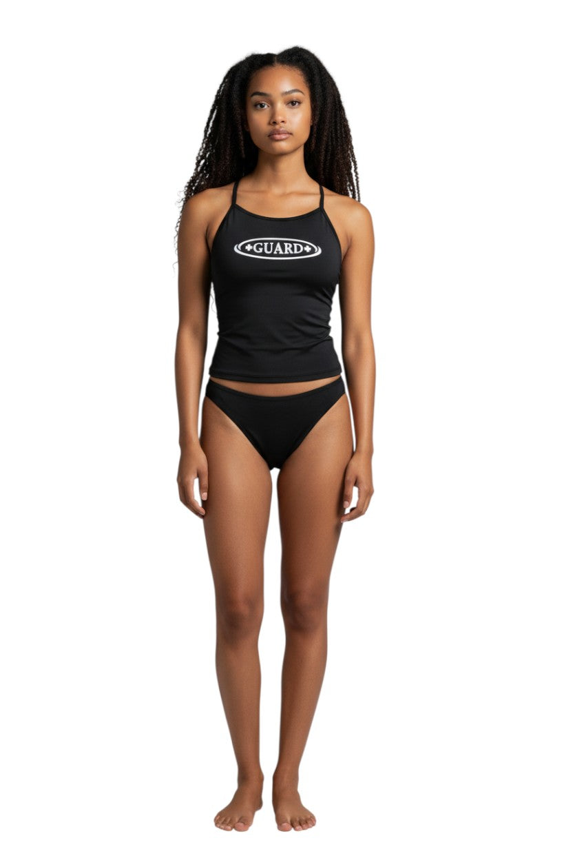 The Lifeguard Store black RISE Guard poly workout tankini with white GUARD logo on a model