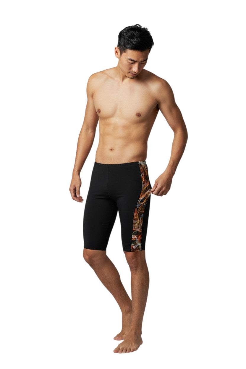 The Lifeguard Store RISE Sandies Helix Poly Jammer swimsuit in black with orange and white abstract helix design on the side. Made of 91% Polyester/9% Spandex.