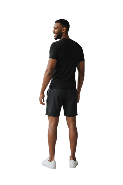 The Lifeguard Store black short sleeve crew neck rashguard with white "INSTRUCTOR" graphic on chest. Made of poly-spandex.