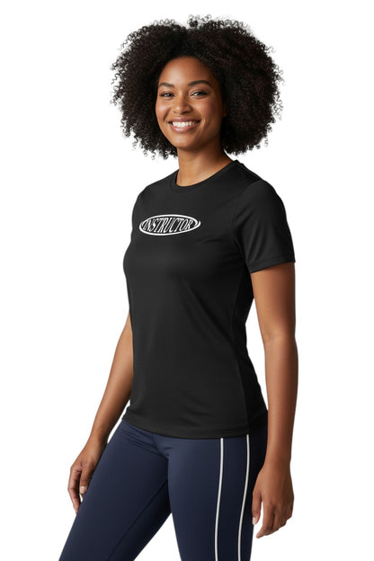 The Lifeguard Store black short sleeve crew neck rashguard with white "INSTRUCTOR" graphic on chest. Made of poly-spandex.