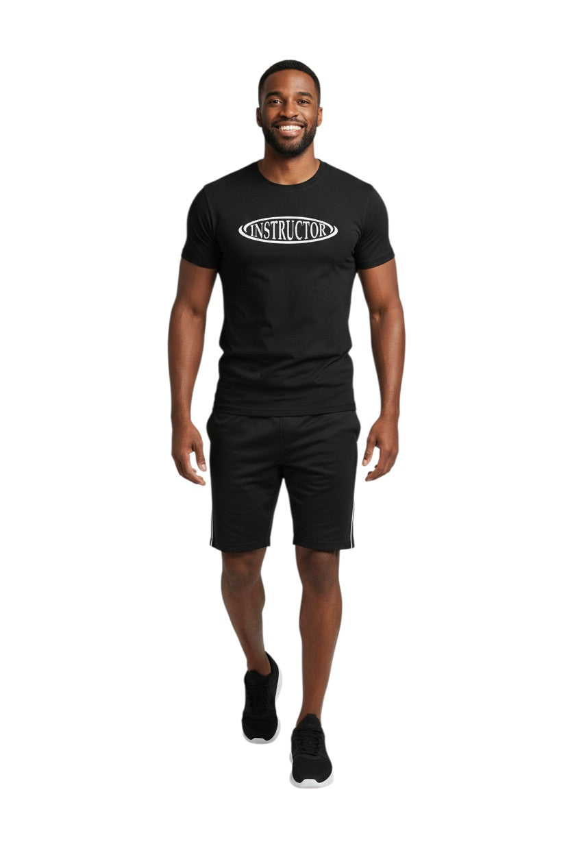 The Lifeguard Store black short sleeve rashguard with white "INSTRUCTOR" graphic on chest. Made of poly-spandex blend.