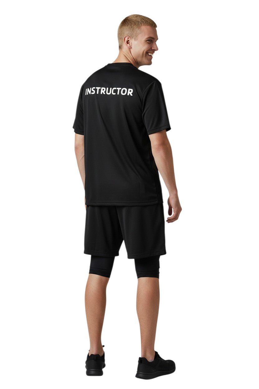 The Lifeguard Store black short sleeve rashguard with white "INSTRUCTOR" text on back. Made of 91% polyester/9% spandex.
