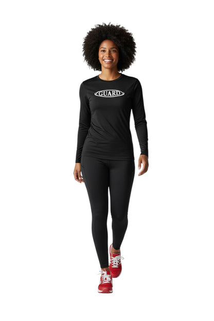 The Lifeguard Store black long sleeve crew neck rashguard with white GUARD logo on chest. Made of 91% polyester/9% spandex.