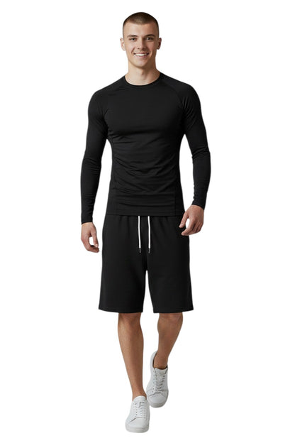 The Lifeguard Store black long sleeve crew neck rashguard made of polyester and spandex with UPF50+ protection.