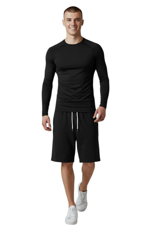The Lifeguard Store black long sleeve crew neck rashguard made of polyester and spandex with UPF50+ protection.
