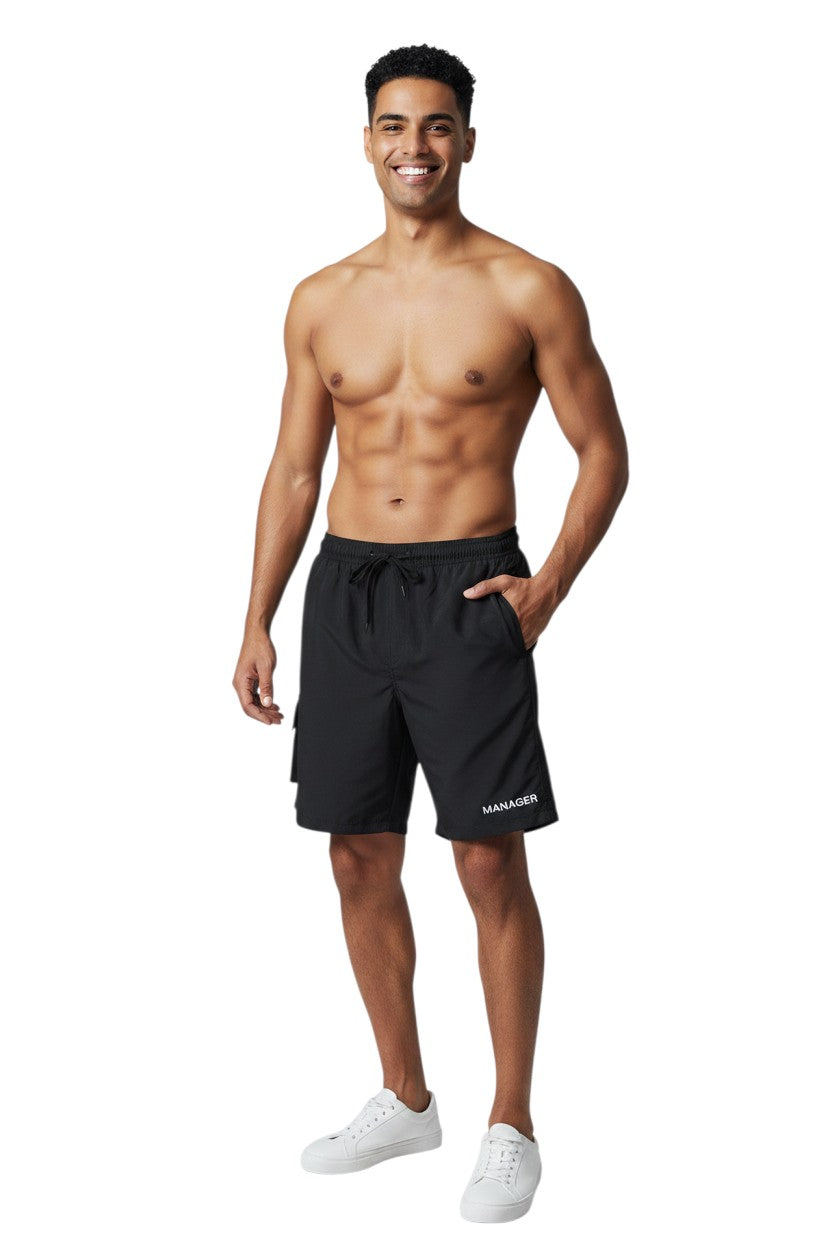 The Lifeguard Store black polyester Manager board shorts with drawstring, cargo pocket, and white trim.