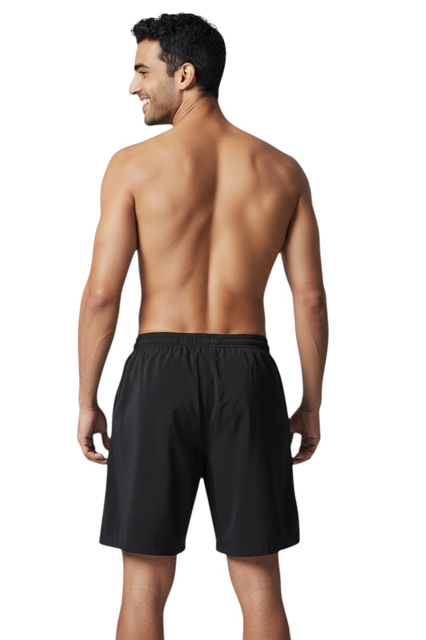 The Lifeguard Store black polyester board shorts with elastic waistband and drawstring, 7" inseam.