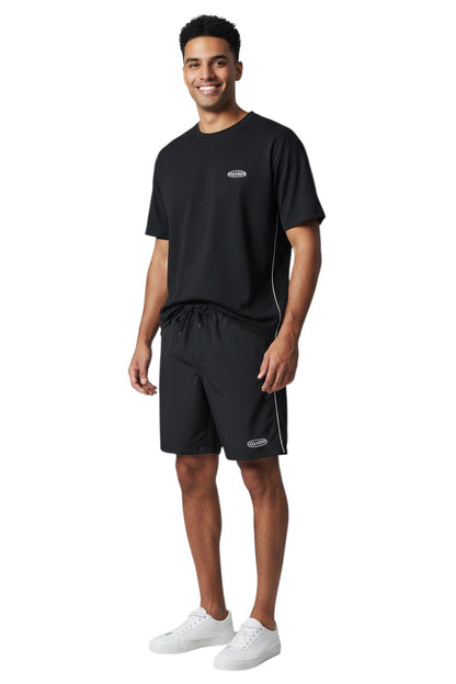 The Lifeguard Store black polyester board shorts with white piping and drawstring waist. Features a 7" inseam.