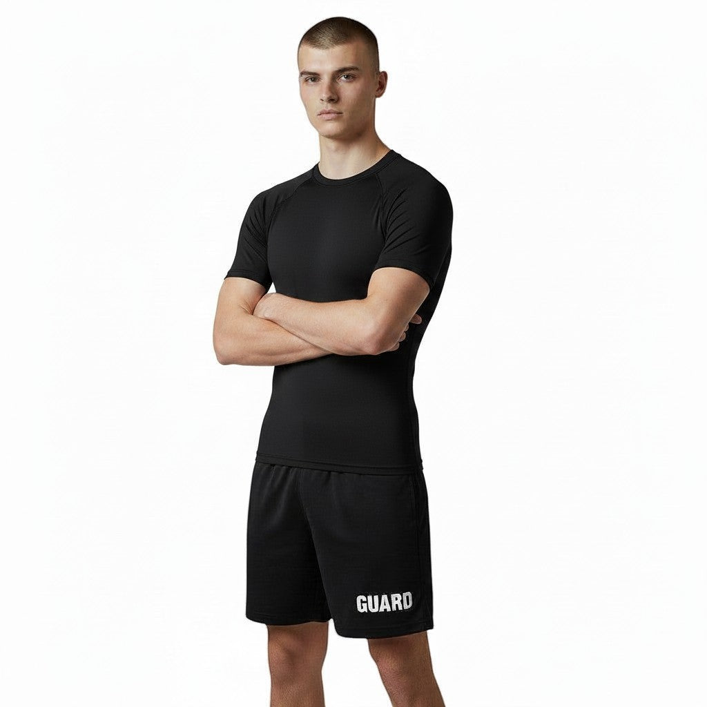 The Lifeguard Store black long sleeve crew neck rashguard with UPF 50+ protection and quick-dry fabric.