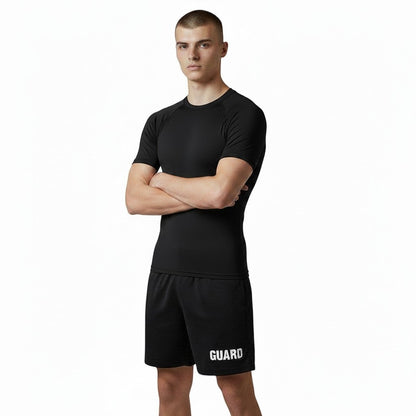 The Lifeguard Store black long sleeve crew neck rashguard with UPF 50+ protection and quick-dry fabric.