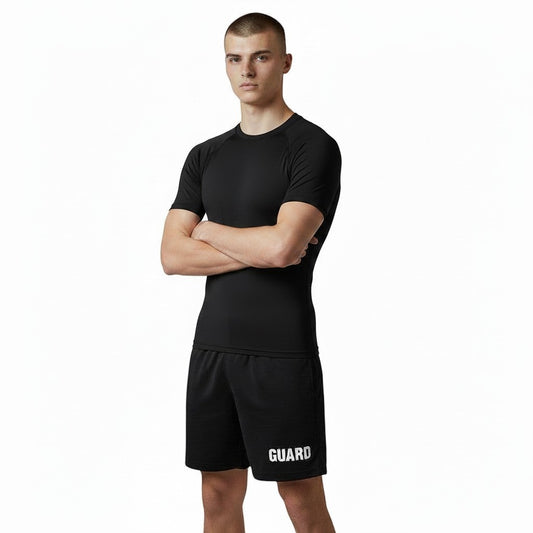 The Lifeguard Store black long sleeve crew neck rashguard with UPF 50+ protection and quick-dry fabric.