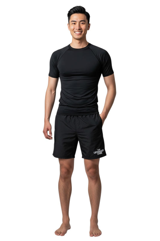 The Lifeguard Store Kiefer Solid Short Sleeve Crewneck Rashguard in black, made of poly-stretch fabric with UPF50+ UV protection.