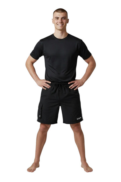 The Lifeguard Store black polyester staff board shorts with side stripe detail and cargo pocket.