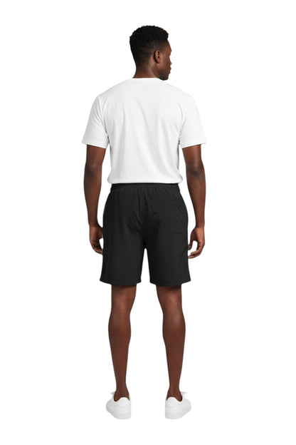 The Lifeguard Store black polyester staff board shorts with liner, elastic waistband, drawstring, and cargo pocket.