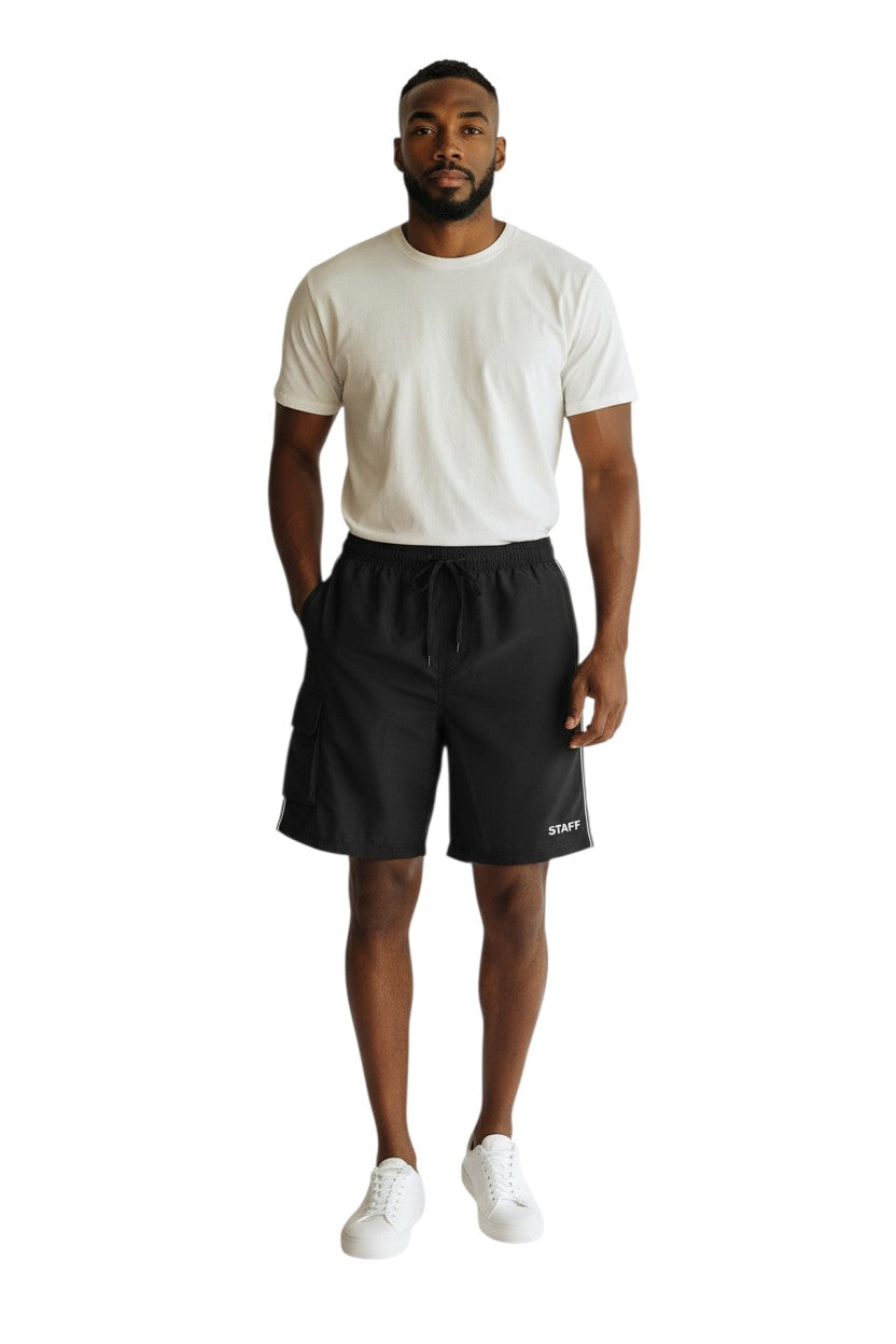 The Lifeguard Store black polyester staff board shorts with liner, elastic waistband, drawstring, and cargo pocket.