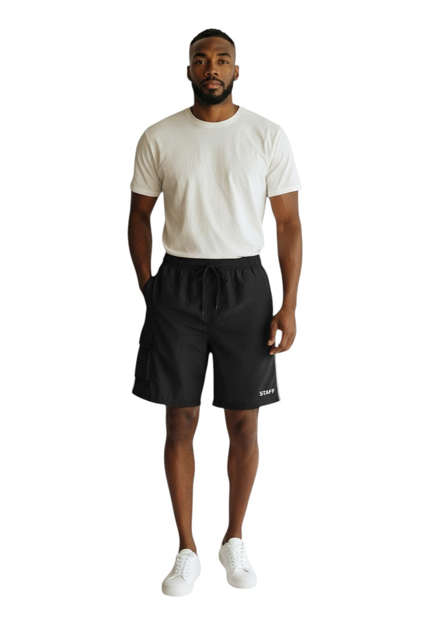 The Lifeguard Store black polyester staff board shorts with liner, elastic waistband, drawstring, and cargo pocket.