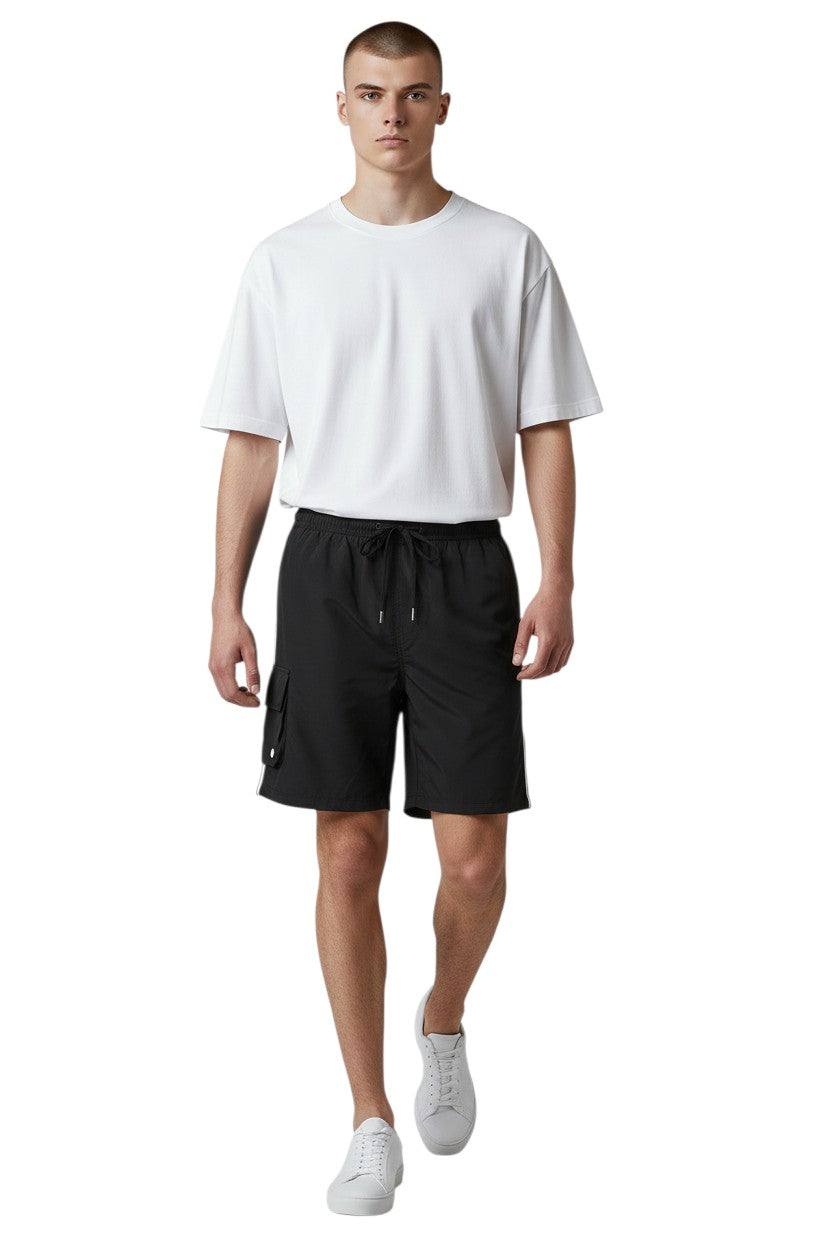 The Lifeguard Store black polyester board shorts with liner, elastic waistband, drawstring, cargo pocket, and "SUPERVISOR" text.