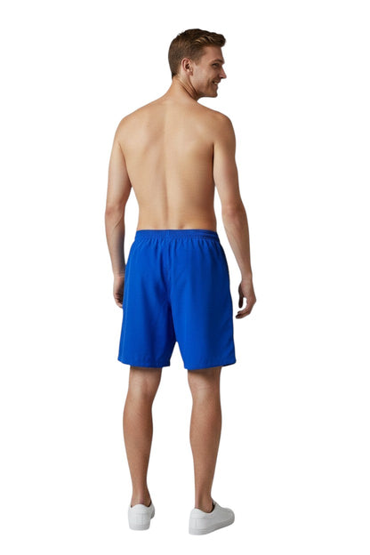 The Lifeguard Store blue polyester board shorts with liner, elastic waistband, and cargo pocket. UPF30+ protection.