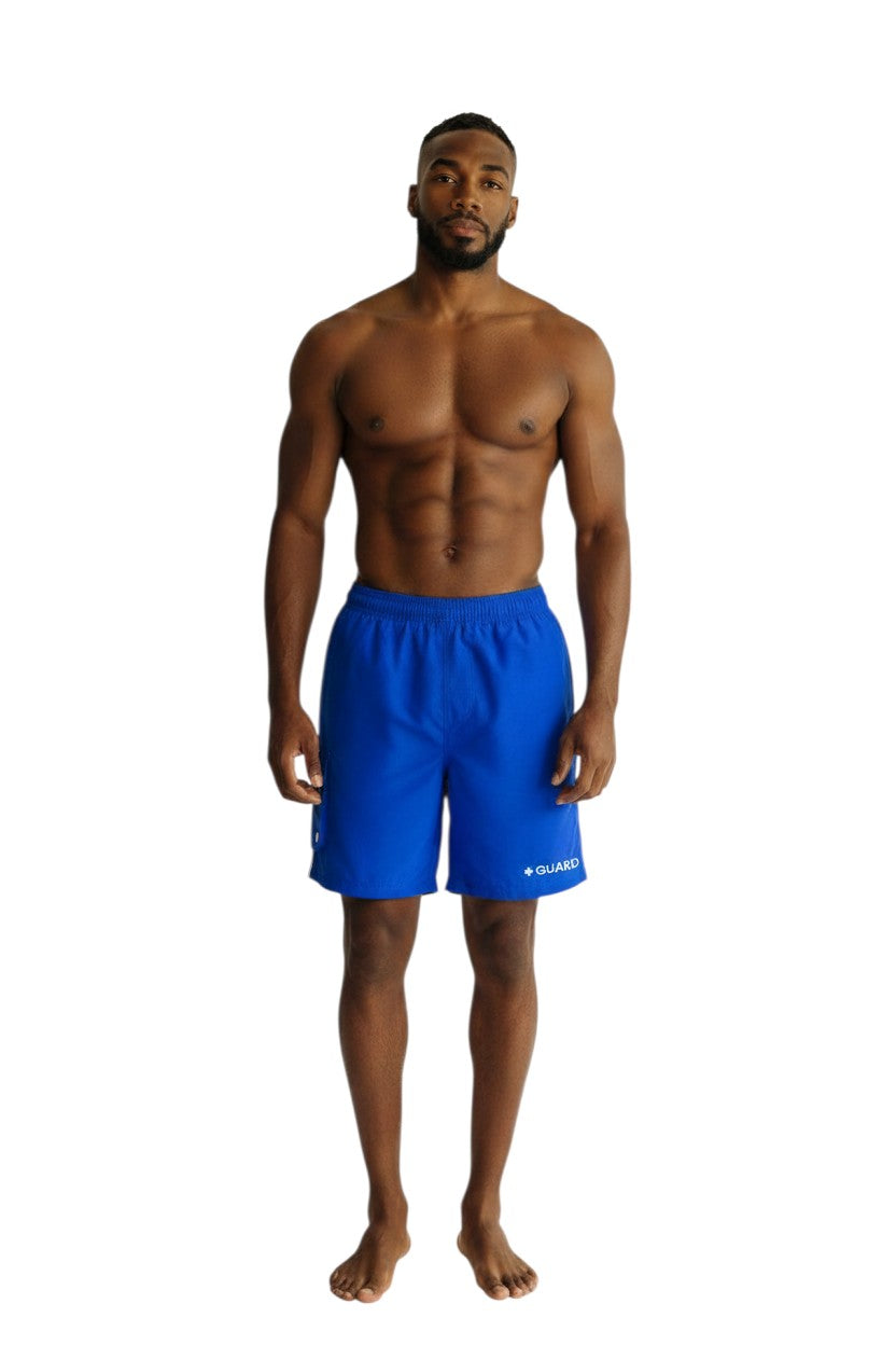 The Lifeguard Store blue polyester board shorts with white drawstring and GUARD logo. Features quick-dry fabric and UPF30+ protection.