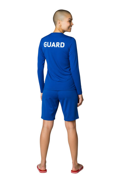 The Lifeguard Store blue long sleeve rashguard with white GUARD text on back. Polyester-spandex blend.