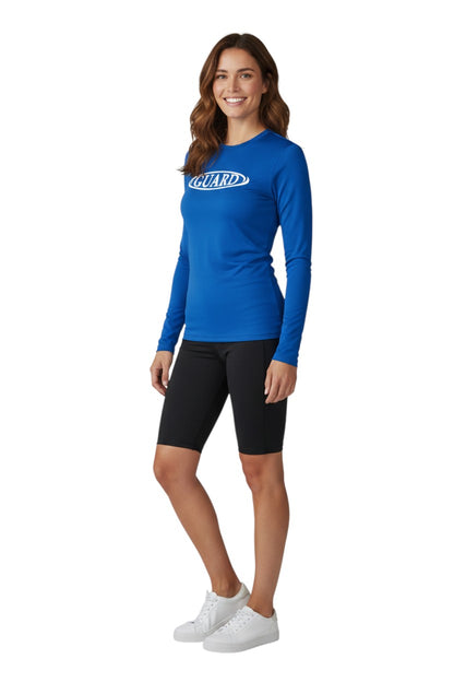 The Lifeguard Store blue long sleeve crew neck rashguard with white GUARD logo on chest. UPF50+ protection.