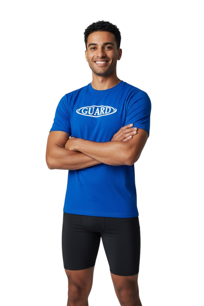 The Lifeguard Store blue short sleeve crew neck rashguard with white GUARD logo on chest. Polyester-spandex blend.