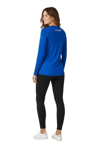 The Lifeguard Store blue long sleeve crew neck rashguard with GUARD printed on the back. Made of poly-spandex blend.