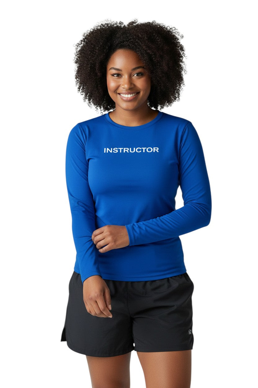 The Lifeguard Store blue long sleeve rashguard with "INSTRUCTOR" printed on the chest. Made of poly stretch fabric.