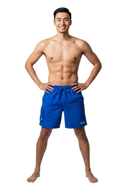The Lifeguard Store blue polyester staff board shorts with white drawstring and side stripe detail.