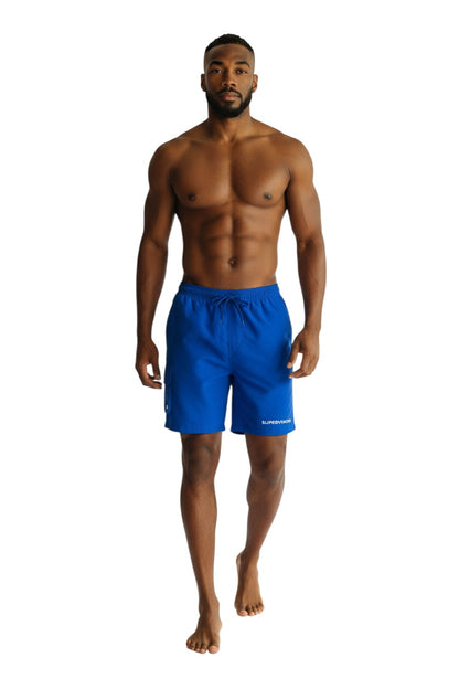 The Lifeguard Store Kiefer Supervisor Board Short with Liner in royal blue. Features elastic waistband, drawstring, cargo pocket, and "SUPERVISOR" text.