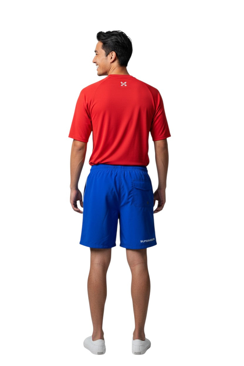 The Lifeguard Store blue polyester supervisor board shorts with elastic waistband, drawstring, and cargo pocket.