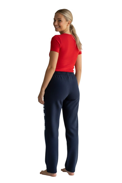 The Lifeguard Store RISE Guard Fleece Pant in navy blue with white 'GUARD' logo down the leg. Made of 50% cotton/50% polyester.